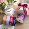 Colorful ribbon rolls are used to decorate the gift box packaging with the words "Just for you" details Picture